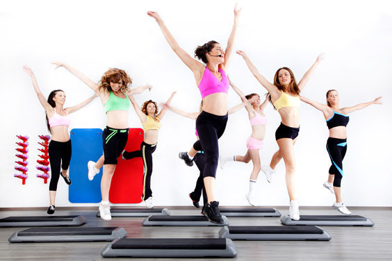 Women Doing Aerobic Exercise on Steppers