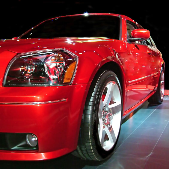 Red Car at an Auto Show
