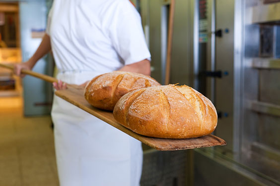 Baker Baking Bread