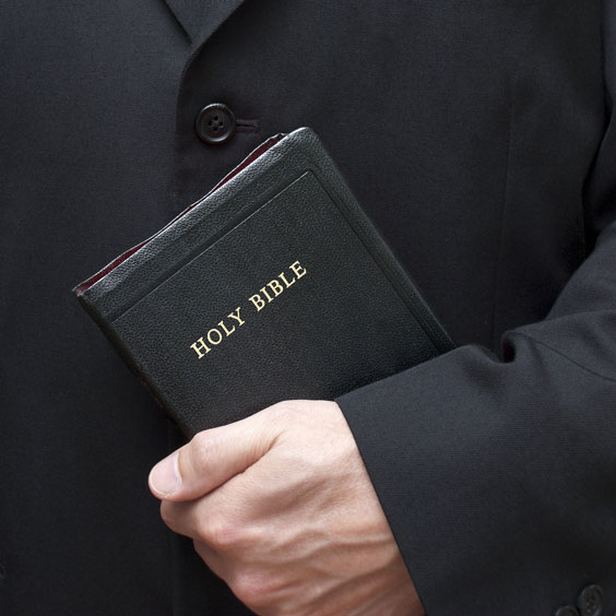 Christian Holding a Holy Bible