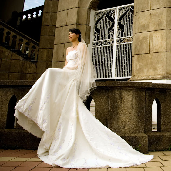 Woman Modeling a Bridal Gown