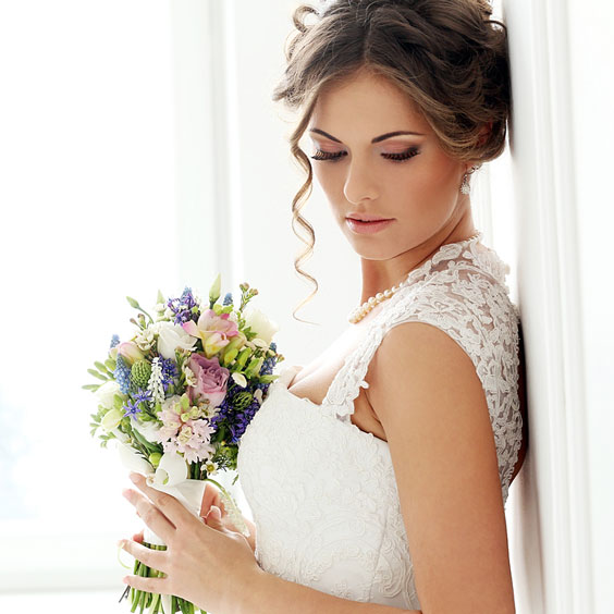 Beautiful Bride with Flower Bouquet