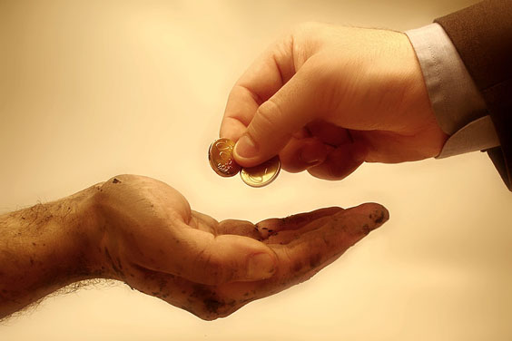 Wealthy Man Donating to Poor Man