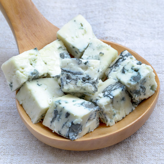 Blue Cheese Squares on a Wooden Spoon