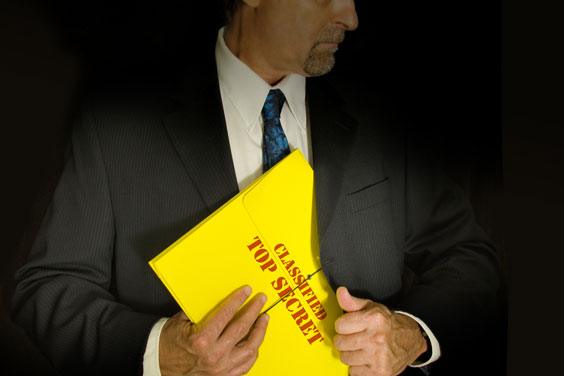 Man Holding a Classified, Top Secret File