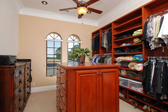 Walk-in Closet with Windows and Ceiling Fan