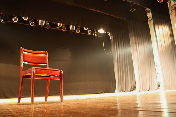 Empty Chair on an Empty Stage