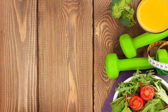 Dumbbells, Healthy Food, and Measuring Tape