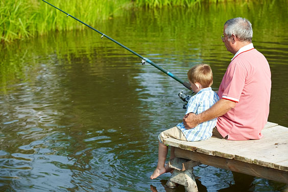 Grandfather and Grandson Fishing Together