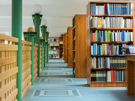 Green Lampposts in a Library