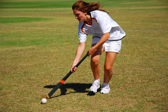 Girl Playing Field Hockey