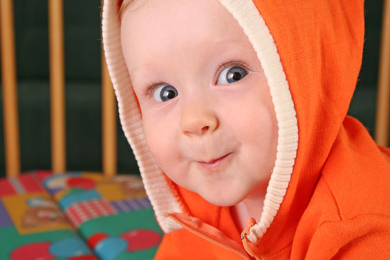 Orange Hood on a Smiling Baby