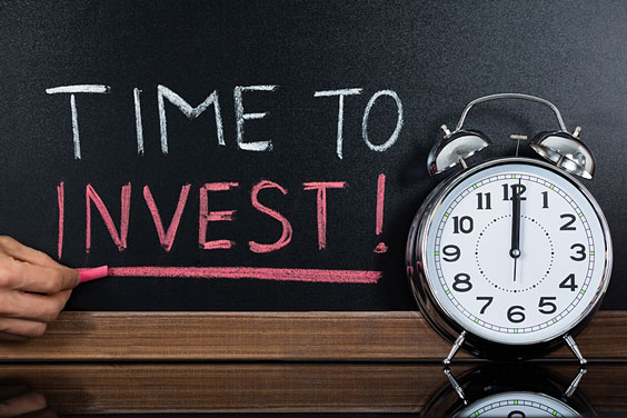 Investing Expression Written on a Blackboard