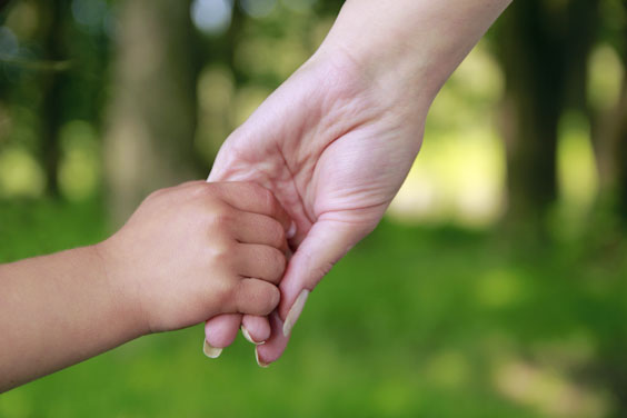 Parent and Child Holding Hands