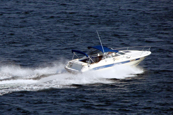 Pleasure Boat on Blue Water