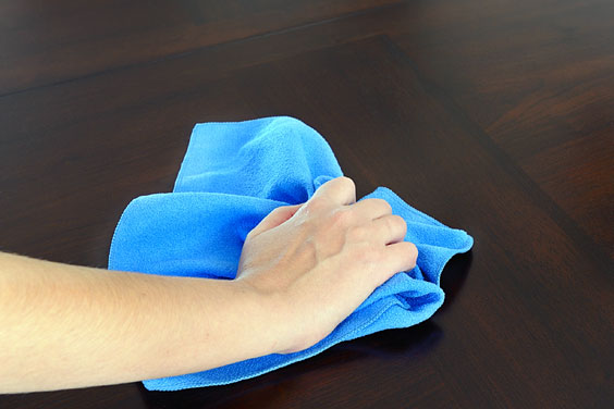 Polishing Wood with a Blue Cloth