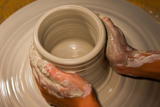 Two Hands Making Pottery