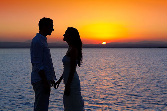 Loving Relationship Silhouetted Against a Sunset