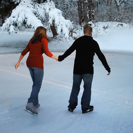 Young Couple Ice Skating