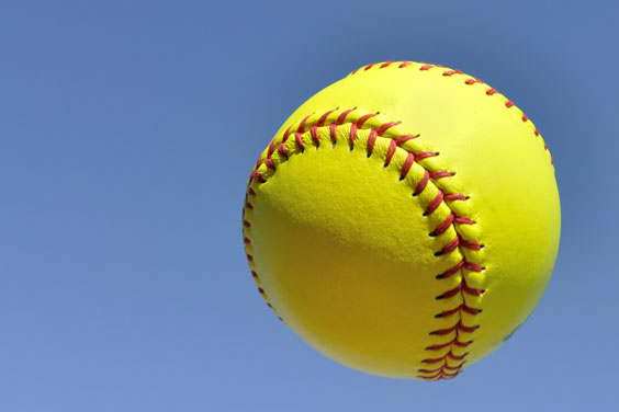 Yellow Softball against a Blue Sky