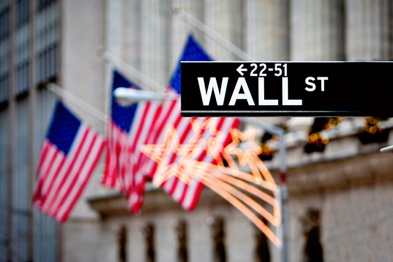 Wall Street Sign and Stock Exchange Building