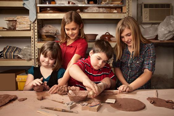 Children Working with Clay in an Art Studio