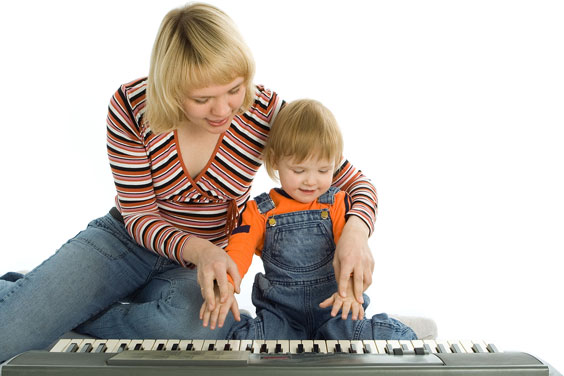 Mother Teaching her Son to Play a Piano