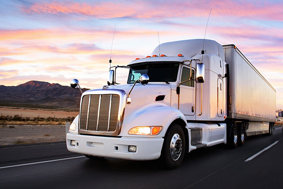 White Semi Truck at Sunset